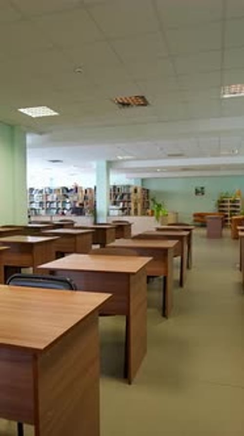 Modern classroom without students. View of auditorium for lectures at university. Vertical video