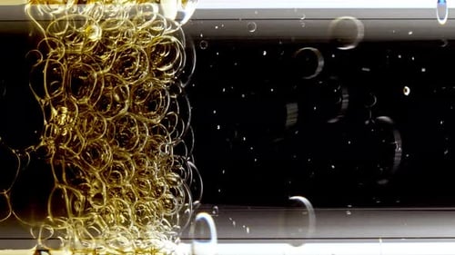 Abstract Golden Bubbles Against a Black Background