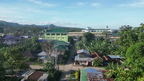 Picturesque Area with Hotel Buildings in City Against Hills