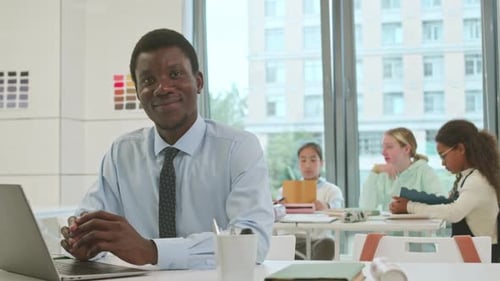 Portrait of African American Male Teacher at School
