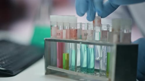Medicine Worker Hands Taking Test Tubes at Experiment in Laboratory Close Up