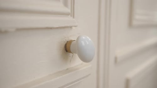 Person stuck inside wardrobe and cant get out, close up view