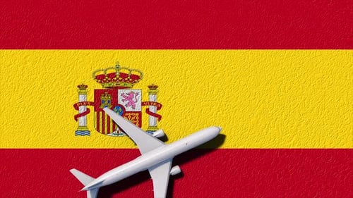 Airplane Flying Over Textured Spain Flag Travel