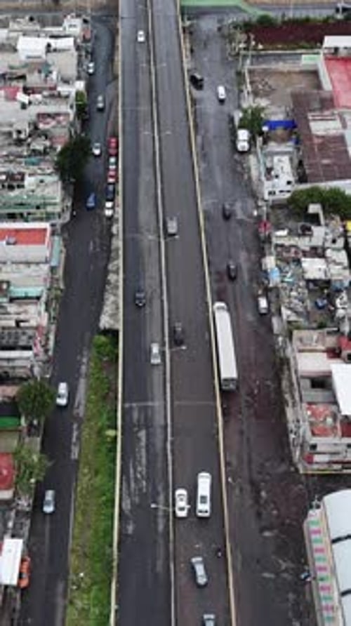Drone footage shows Ecatepec’s damaged streets. Vertical shooting