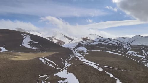Majestic Snowy Mountains in Winter Aerial View