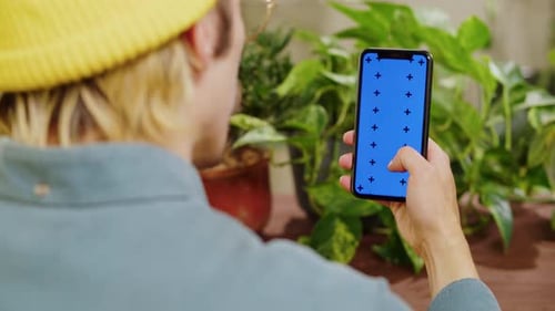 Florist Man Using Smartphone with Chroma Key