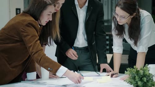 Team Brainstorming Strategy in a Modern Office Workplace