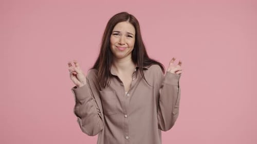 Happy Young Woman Posing on Pink Background