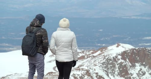 Hikers Climb Rocks in Rocky Mountains, View of Mountain Landscape Adventure