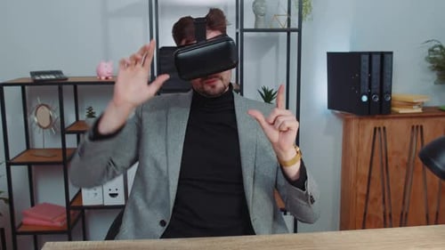 Businessman Working Using Virtual Reality Futuristic Technology VR App Headset Helmet at Home Office