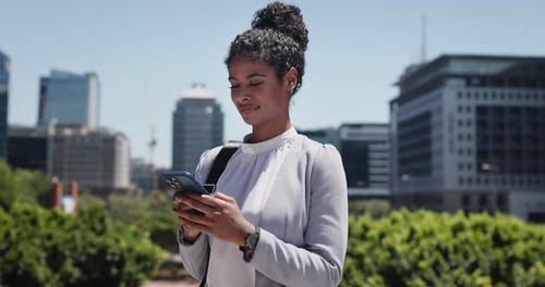 Phone, professional and businesswoman in city for communication, typing or email on mobile app