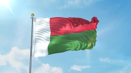 Realistic Flag of Madagascar Waving in Blue Sky