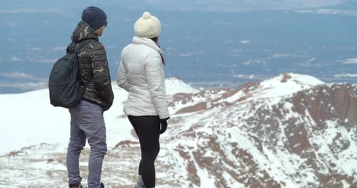Hikers Climb Rocks in Rocky Mountains, View of Mountain Landscape Adventure