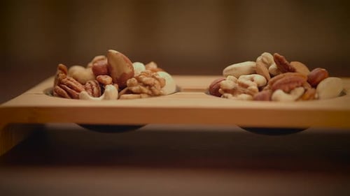 Mixed Nuts of Almonds Pecan Walnuts Cashews Hazelnuts on Wooden Table