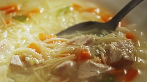 Delicious Chicken Noodle Soup with Vegetables The Concept of Homemade Food