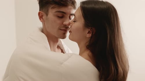 Young Couple Shares Tender Moment Indoors