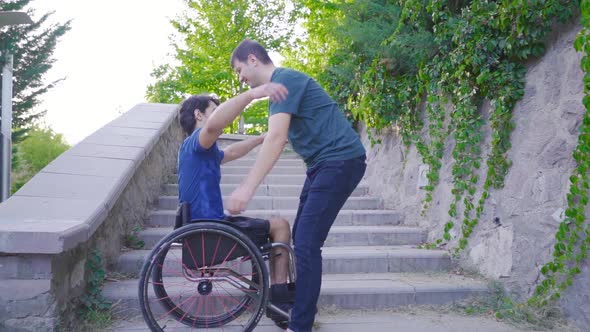 Hug. The friend who hugs the young person with a physical disability ...