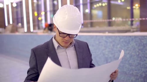 Businessman Man Engineer Architect Using Drawing Blueprint Night Sport Spa Pool Window Office
