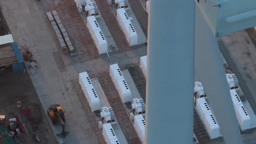 Wind turbine powering large scale battery energy storage system