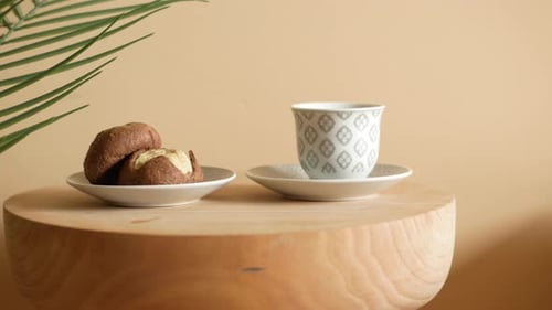 Pastries and Hot Beverage on Wooden Table