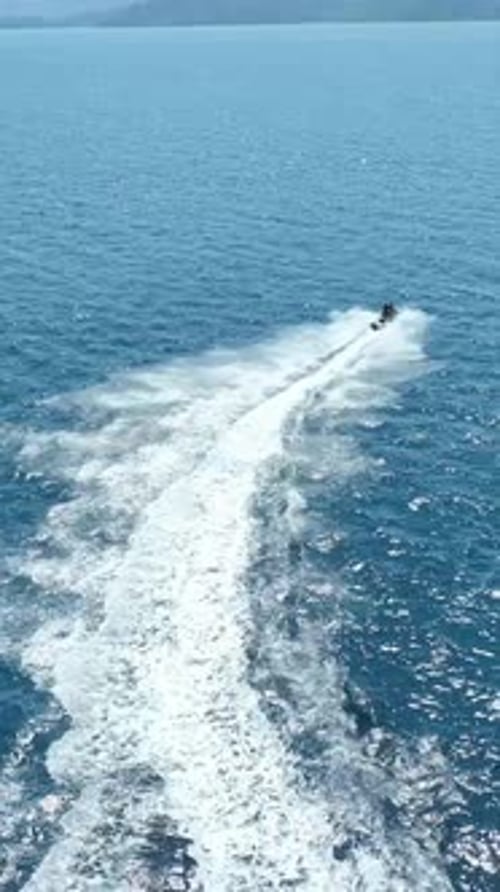 Fun jet ski riding during summer holiday