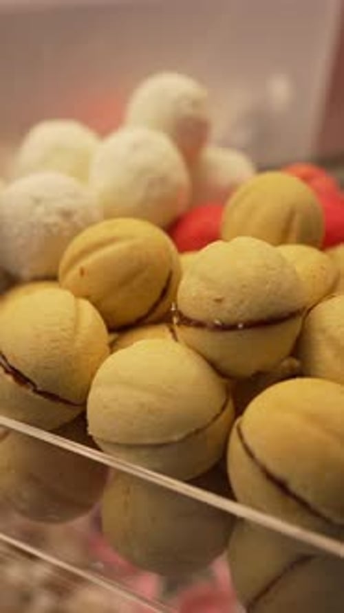 Exquisite Macarons in Delicate Composition in Pastry Shop Gourmet Delight Concept