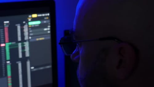 close up of stock broker trading forex and cryptocurrency using analysis charts