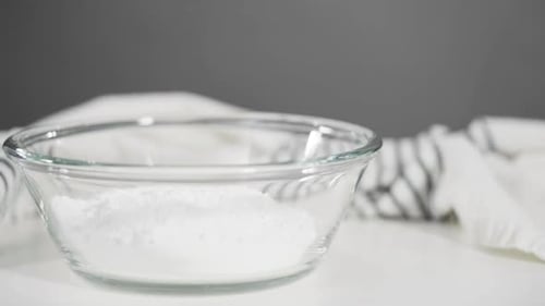Mixing Ingredients in Glass Bowl for Baking