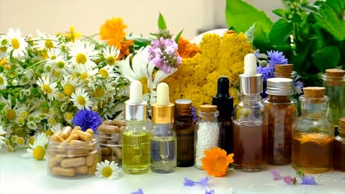 Colorful Wildflowers and Apothecary Bottles Still Life