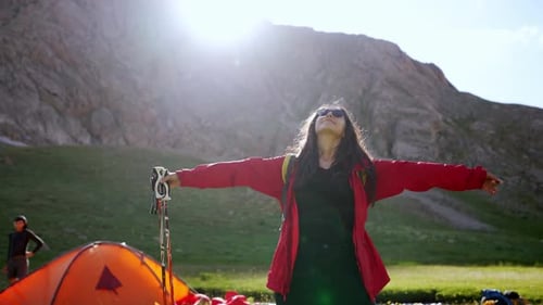 Happy Woman in Mountain Camp Site