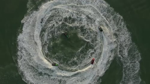 Aerial view of jet skis in circle, Belgium.