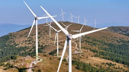 Aerial view of wind turbines on a hill, Austria.