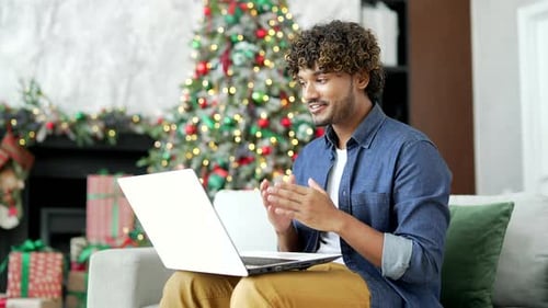 Man Chatting Online at Christmas Time