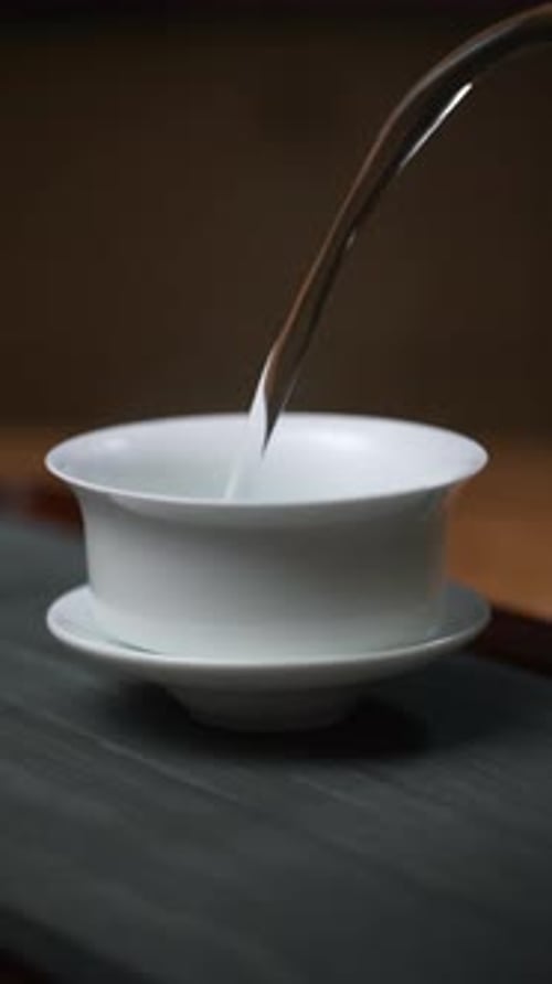 Master the Elegant Art of Tea Pouring with Traditional Chinese Teaware for a Unique Experience Media