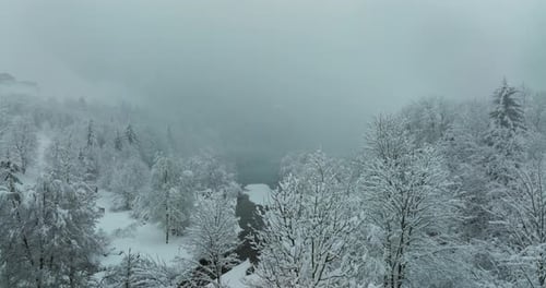 Drone Flight Over Winter Landscape And Frozen Lake