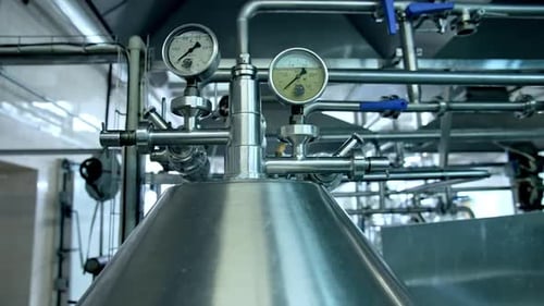 Industrial Equipment and Stainless Steel Piping in Factory