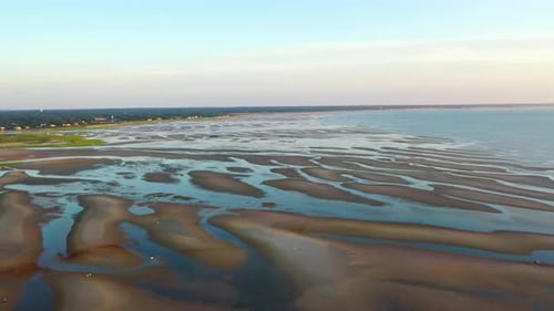 Cape Cod Bay Aerial Drone Footage of Beach at Low Tide with People Walking, Sand Bars and Puddles Du