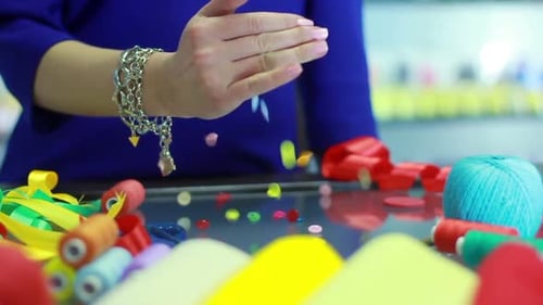 Sewing Buttons Falling on Glass Table. Sewing Shop. Sewing Supplies. Seamstress Released