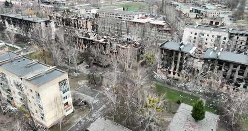 Drone Flying Over a Destroyed District