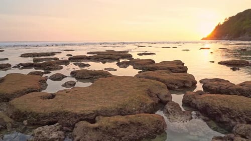 Sunset Above Calm Ocean and Rocks in Shallow Water at Tropical Lagoon, Panorama. Exotic Landscape Sc