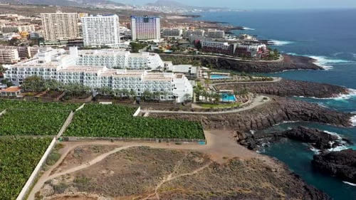 Aerial drone footage of the beautiful town of Costa Adeje, Santa Cruz de Tenerife in Spain