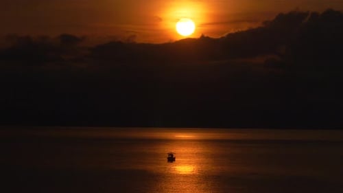 Kayak on the sea and sunset