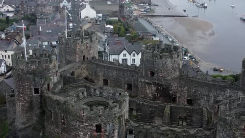 Historic Conwy castle aerial view of Landmark town ruin stone wall battlements tourist attraction Bi