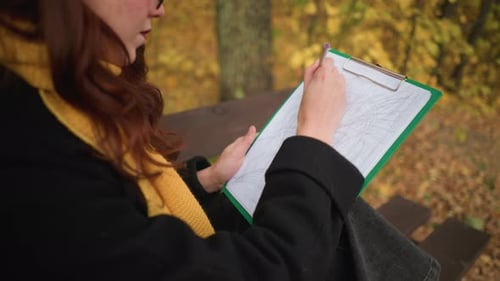 Close Up Artist in Yellow Beret Sketching on Canvas in Autumn
