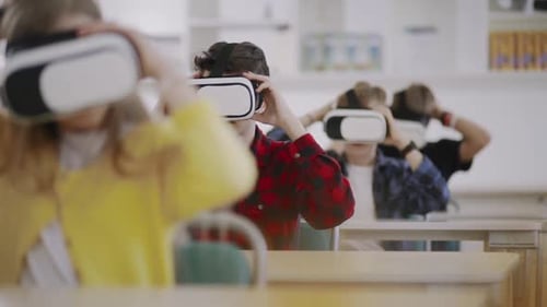 Students Using VR Headsets in Classroom Setting