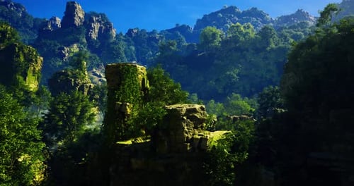 Daytime Mountain View with Lush Greenery and Rocky Formations