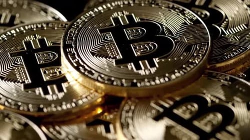 Pile of Golden Bitcoin Cryptocurrency Coins