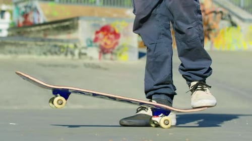 Skate Tricks in Action in an Urban Skate Park