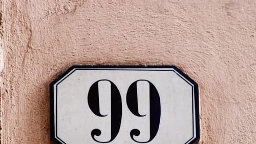 Number 99 (ninety-nine) Affixed to a Building