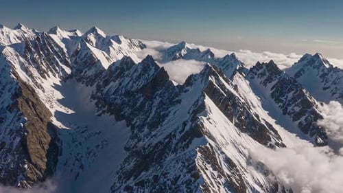 Majestic Aerial View of Snow Capped Mountains